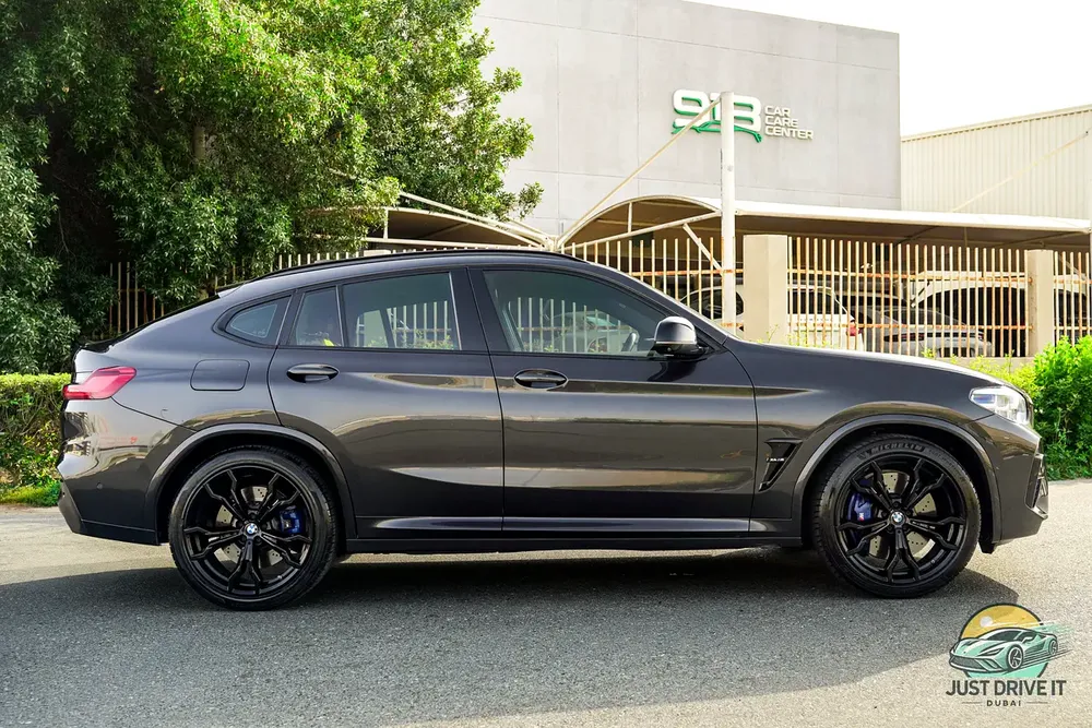 BMW X4M Competition 2021 GCC | 35K kms | Warranty + Service until 2027 | Cartier Red | Full Carbon - Image 12