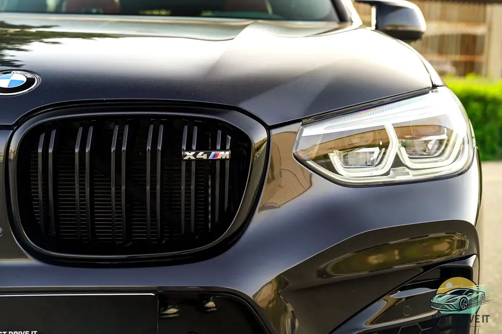 BMW X4M Competition 2021 GCC | 35K kms | Warranty + Service until 2027 | Cartier Red | Full Carbon - Image 18