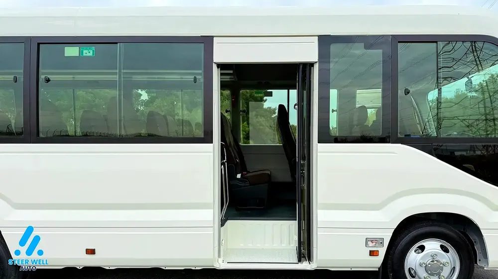 2025 Toyota Coaster 23-Seater Bus 4.0L Diesel RWD GCC Specs Full Option White - Image 9