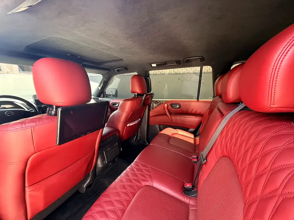 2023 Nissan Patrol LE Platinum V8 | Full Service History | GCC | Red Custom Interior - Image 13