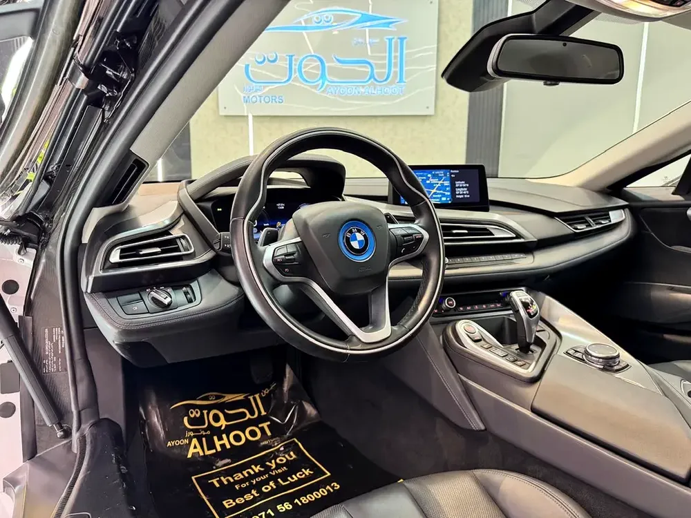 ELITE BMW I8 || GCC II FULLY LOADED || ACCIDENT FREE || VERY LOW MILEAGE || F.S.H BMW - Image 16