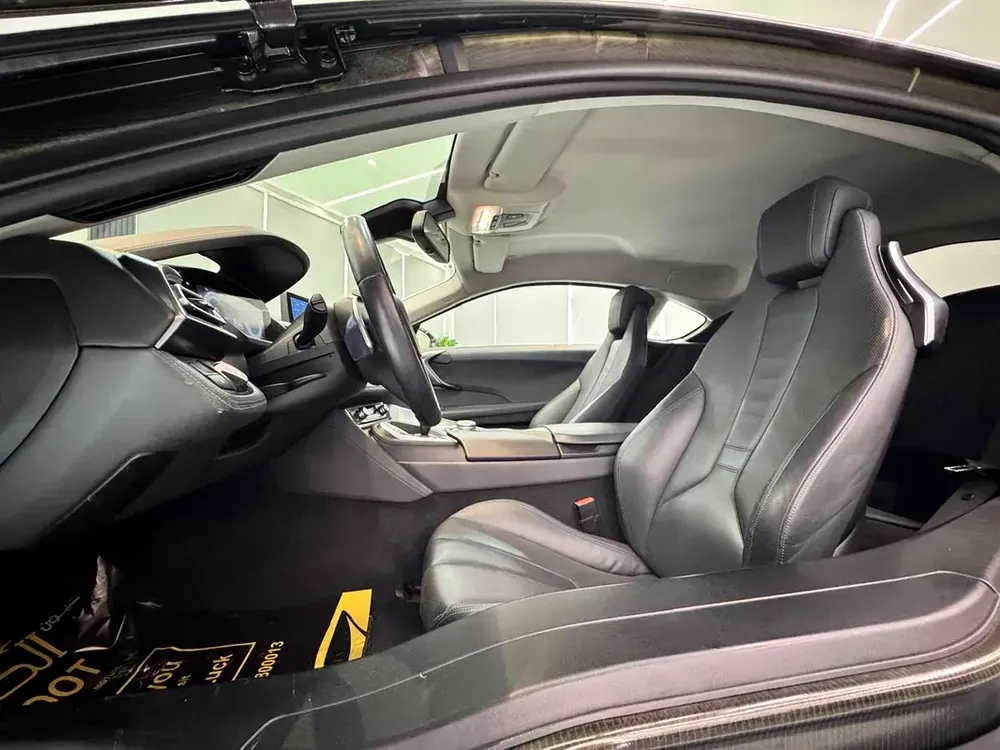 ELITE BMW I8 || GCC II FULLY LOADED || ACCIDENT FREE || VERY LOW MILEAGE || F.S.H BMW - Image 17