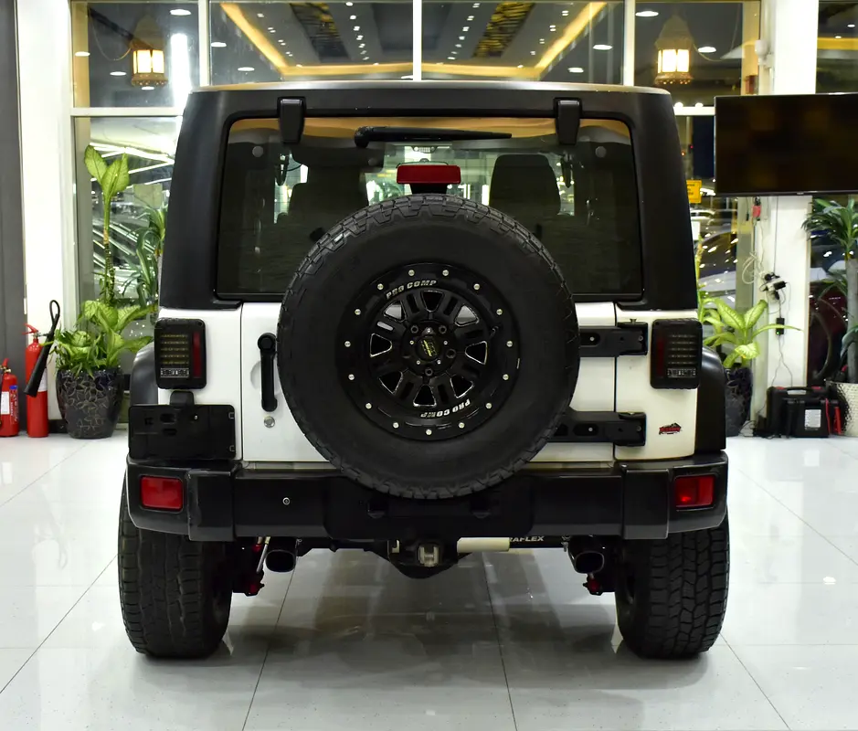 EXCELLENT DEAL for our Jeep Wrangler Sport ( 2012 Model ) in White Color GCC Specs - Image 5