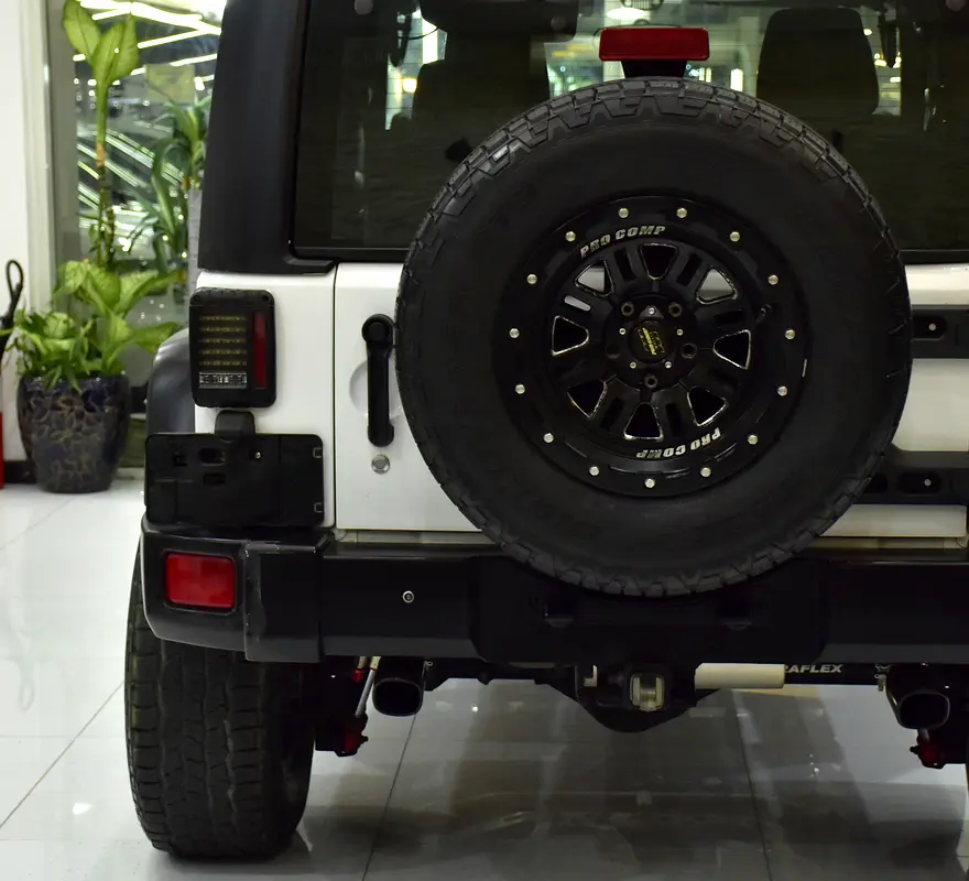 EXCELLENT DEAL for our Jeep Wrangler Sport ( 2012 Model ) in White Color GCC Specs - Image 8