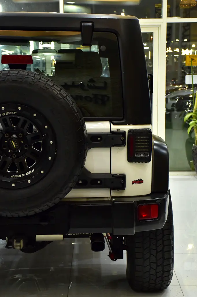EXCELLENT DEAL for our Jeep Wrangler Sport ( 2012 Model ) in White Color GCC Specs - Image 9