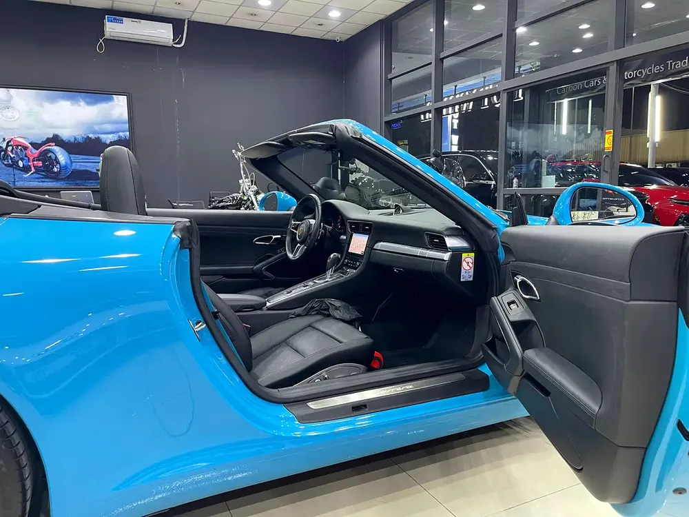 PORSCHE CARRERA CABRIOLET MIAMI BLUE GCC FULL PORSCHE SERVICE HISTORY - Image 18