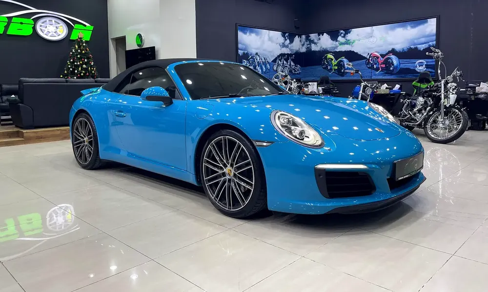 PORSCHE CARRERA CABRIOLET MIAMI BLUE GCC FULL PORSCHE SERVICE HISTORY - Image 5