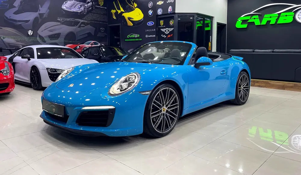PORSCHE CARRERA CABRIOLET MIAMI BLUE GCC FULL PORSCHE SERVICE HISTORY - Image 6