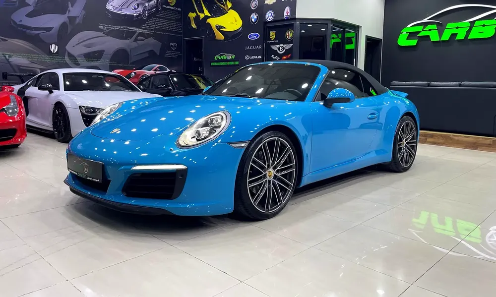 PORSCHE CARRERA CABRIOLET MIAMI BLUE GCC FULL PORSCHE SERVICE HISTORY - Image 7