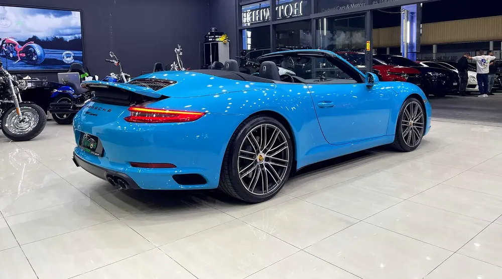 PORSCHE CARRERA CABRIOLET MIAMI BLUE GCC FULL PORSCHE SERVICE HISTORY - Image 9