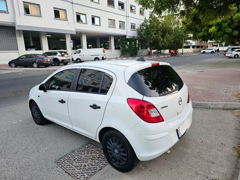 Opel Corsa Color Edition 2013 - GCC Specs Opel Corsa 2013 ..GCC. LOW MILEAGE.. PASS IN RTA - Image 10