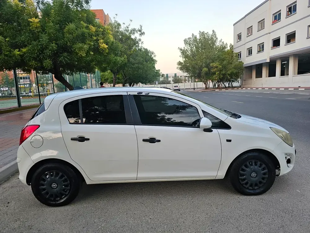 Opel Corsa Color Edition 2013 - GCC Specs Opel Corsa 2013 ..GCC. LOW MILEAGE.. PASS IN RTA - Image 11