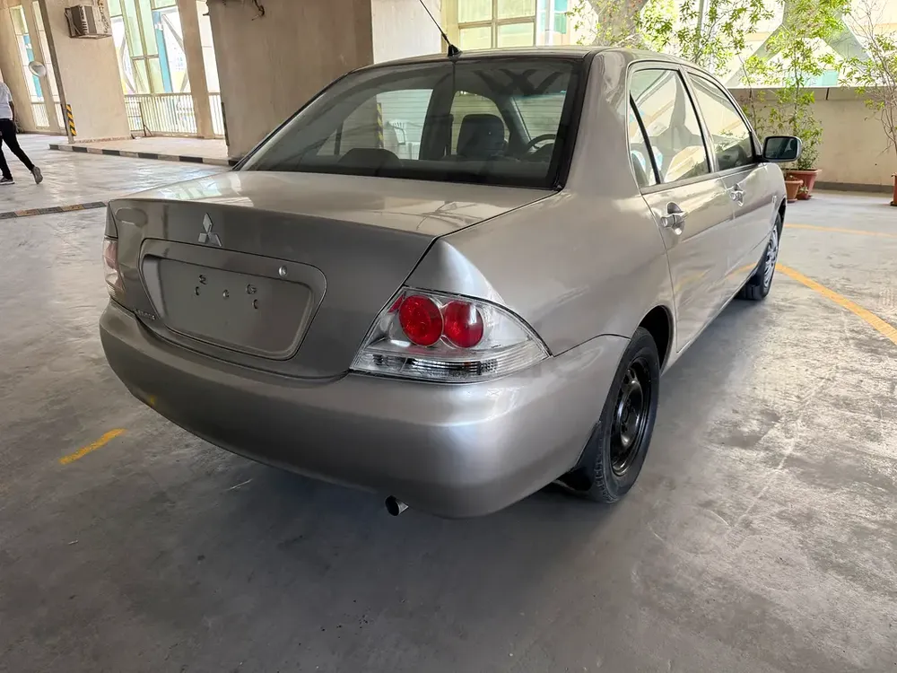 Mitsubishi Lancer GLS 2009 GCC Specs 1.3. 4 cylinder.RTA passed. Ready for registration. - Image 5