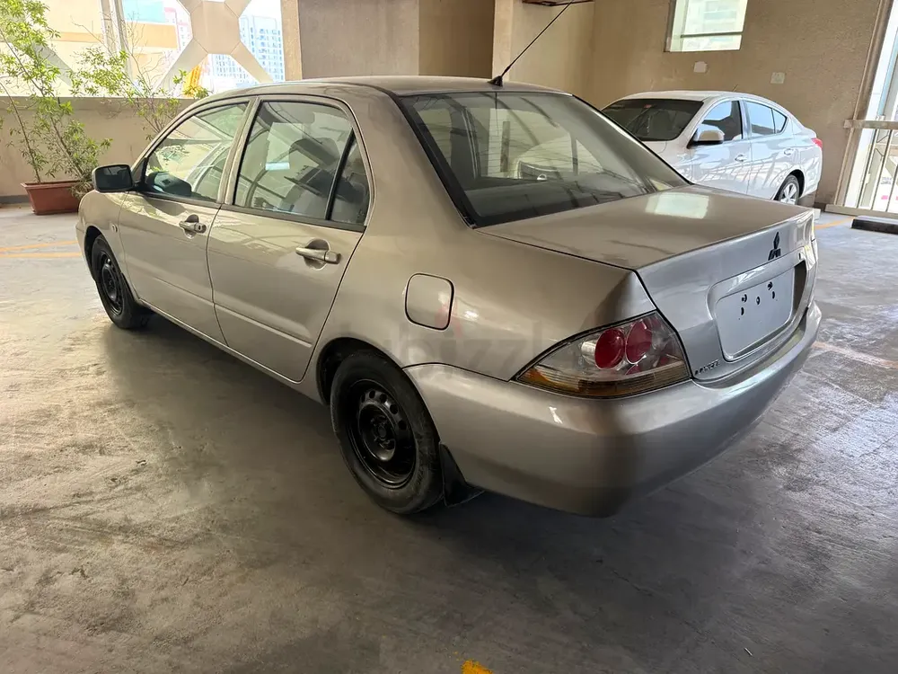 Mitsubishi Lancer GLS 2009 GCC Specs 1.3. 4 cylinder.RTA passed. Ready for registration. - Image 9