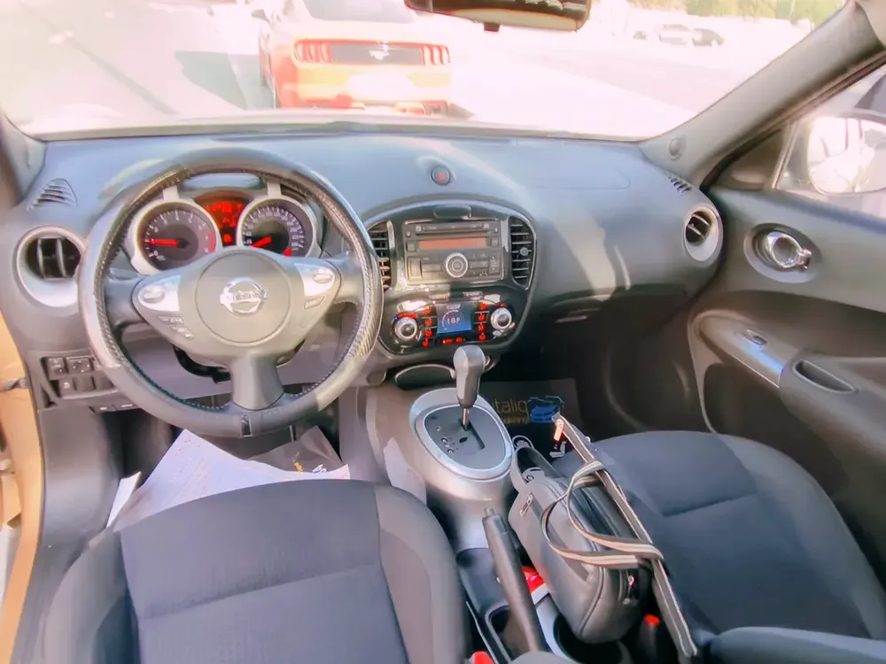 Nissan Juke 2014 GCC Specs Cruise control. Volume button on steering.Push start.Door lock in finger. - Image 6