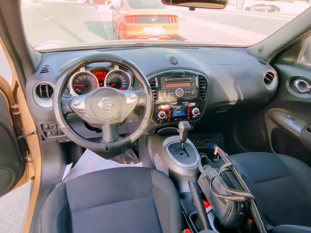 Nissan Juke 2014 GCC Specs Cruise control. Volume button on steering.Push start.Door lock in finger. - Image 9