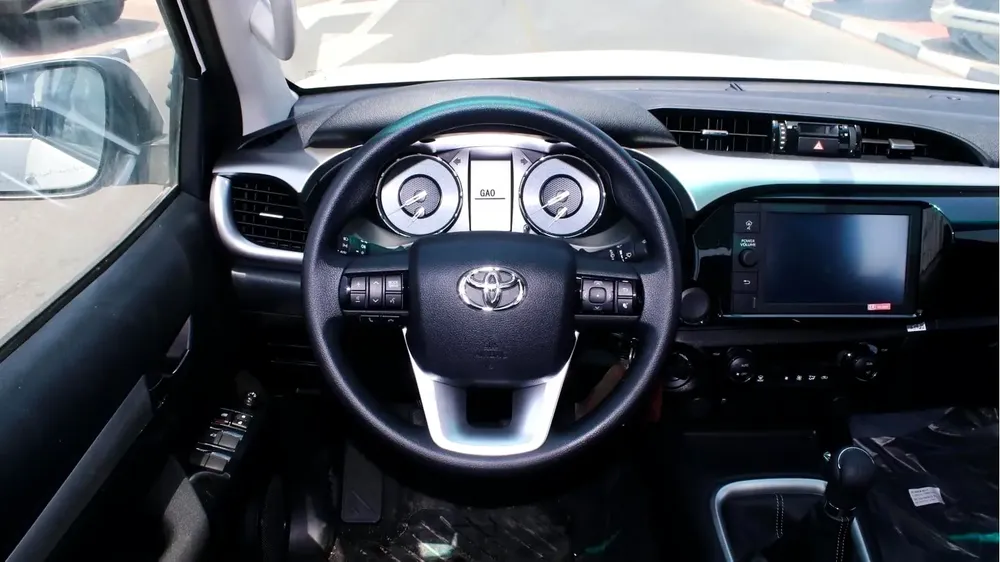 Toyota Hilux SR5 2.4L diesel  . White 2025 model, M/T Wide body with Chrome bumper - Image 10