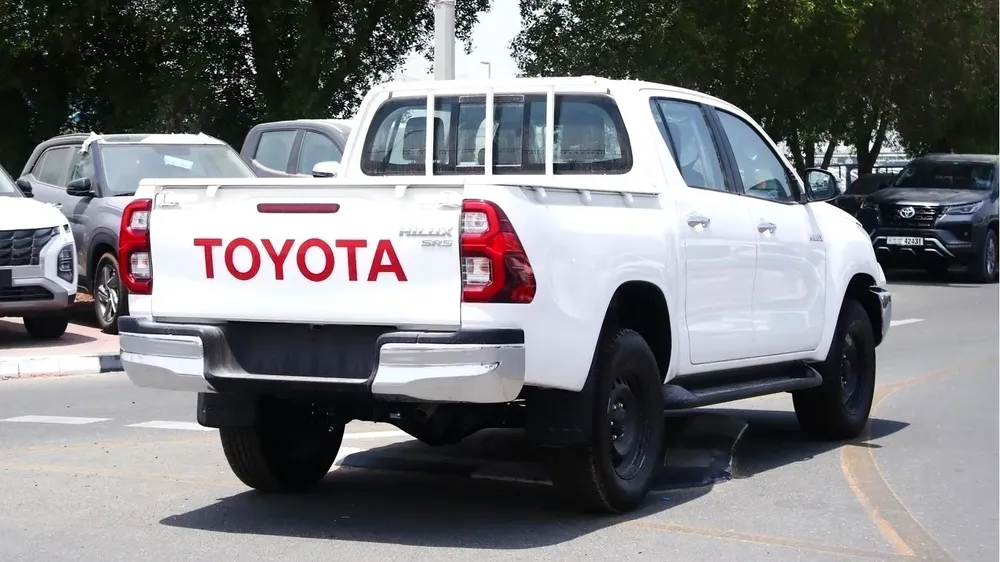 Toyota Hilux SR5 2.4L diesel  . White 2025 model, M/T Wide body with Chrome bumper - Image 6